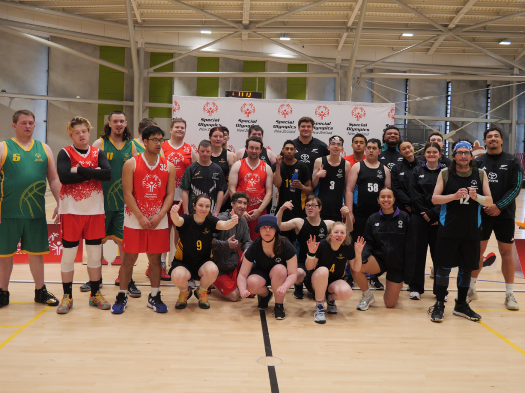 Hunter with basketball teams at an All Blacks event in Wellington